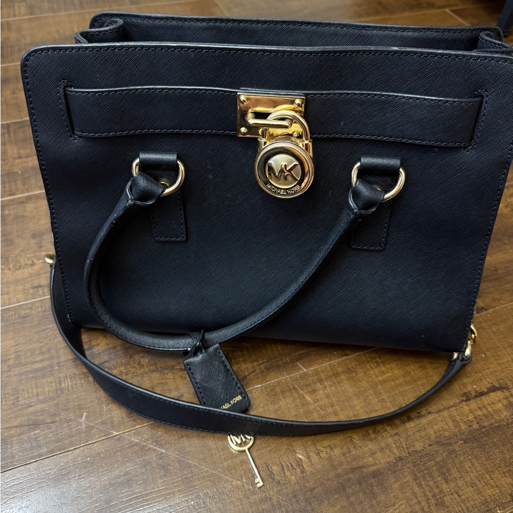 Michael Kors Black Satchel with Gold Accents